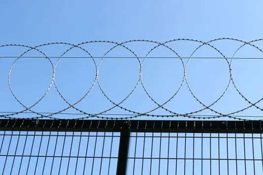 Razor wire flat security barrier